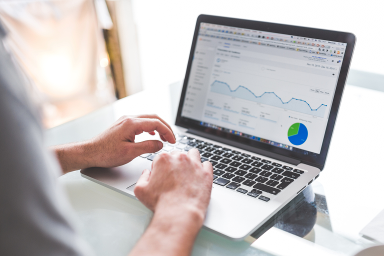 An image of a guy working and collecting data for self storage management.