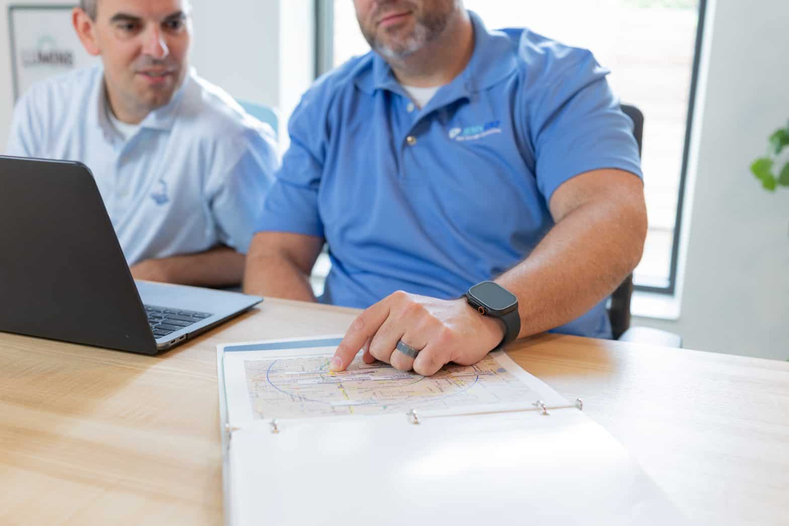 BMSGRP President discussing a snap report with client