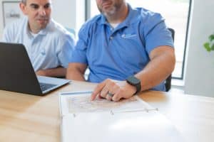 BMSGRP President discussing a snap report with client